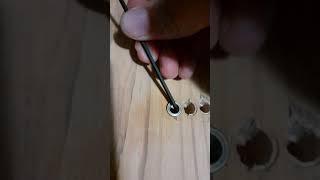 How to remove string ferrules or bushings from guitar body.