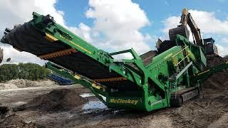 McCloskey R230 Scalping Screener into ST100T Track Stacker producing 500 TPH of Fill Dirt