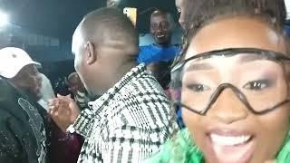 Commentator and Maureen ngigi enjoys their moment on stage during Vinny Flava's ep album launch