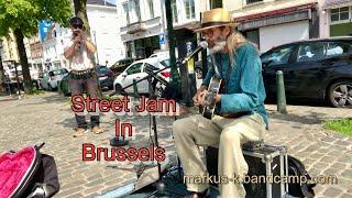 Busking in Brussels - completely improvised, with blues harp, guitar, looper, vocals