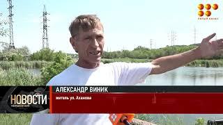 Сброс тонн строительного мусора в озеро с уточками попало на видео в Караганде
