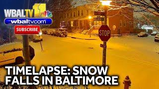 Timelapse shows snow falling in Baltimore