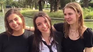 Wetlook young girls black skirts, go into a fountain