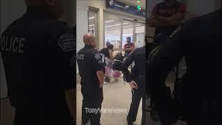 LAX airport police dealing with a woman who is trespassing at LAX airport