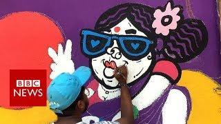 Mumbai slum gets colourful makeover - BBC News