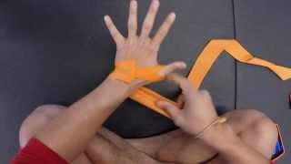 How to Wrap your Hands for Muay Thai, Boxing, or Kickboxing - Closed Palm Style