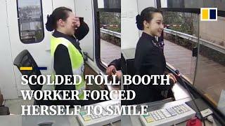 Scolded by driver, toll booth worker in China forces herself to smile