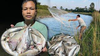 Fishing  with Hand Fiishing Net at the River