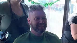 Charity head shaving event raises thousands for cancer research