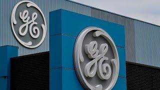 General Electric freezes pension plans for 20,000 US employees in an effort to cut debt