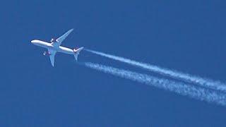 Planes cruising at high altitude over Lake Windermere in the UK