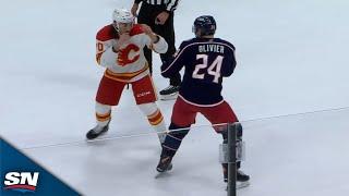 Ryan Lomberg and Mathieu Olivier Exchange Flurry of Blows in Fiery Tilt