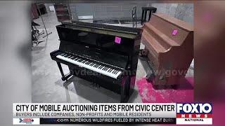 Bidders compete for Mobile Civic Center history, including chair Elvis (maybe) used