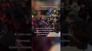 US Flag Saved From Flames Amid Protests