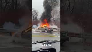 Car under fire. Boston, Massachusetts