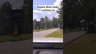 Deputy dives under crashing car