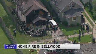 Firefighters battle house fire in Bellwood