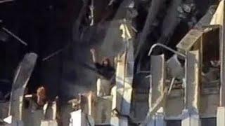 Good quality video of edna cintron waving on the north tower of wtc