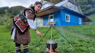 MARIA LIVES ALONE IN THE MOUNTAINS. COOKING LUNCH ON THE CAMPFIRE