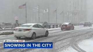 Snow blankets Chicago, suburbs