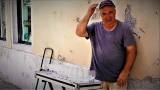 Glass harp street performer in Murano, Venice.