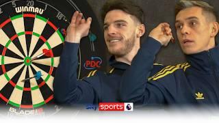 "No chance!" | Leandro Trossard calls for VAR in darts challenge against Declan Rice 