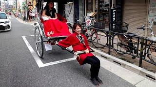 A Day in Life of Japanese Rickshaw Puller Driving Clients Around Tokyo