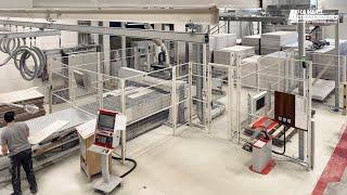 Reichenbacher Durchlaufanlage für Beplankungsteile bei Regnauer Fertigbau