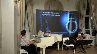 Arkadiy Reznik and Anna Reznik perform "Jewish Rhapsody" by Roman Lvovich for guitar and piano