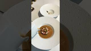 Creamy lobster bisque with a seafood ravioli and emulsified American sauce #delicious #eligant
