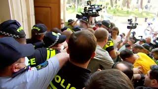 Scuffles flare in Georgia parliament after death of journalist