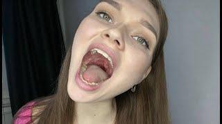 Beautiful giantess shows her uvula and mouth