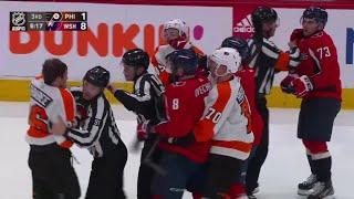 Scrum ensues between the Capitals and Flyers after Joel Farabee cross-checks Connor Sheary