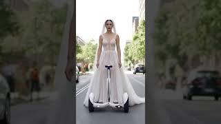 "BRIDE RIDING A HOVERBOARD IN THE CITY!  BLEW UP THE STREETS! "