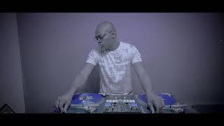 DJ TEE messing around different songs from different genres and countries