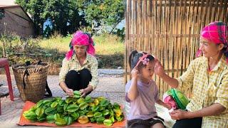 After a day in the forest picking fruit to sell,the mother bought her daughter a hair clip as a gift