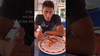 my boyfriend rating pizza in Venice, Italy 