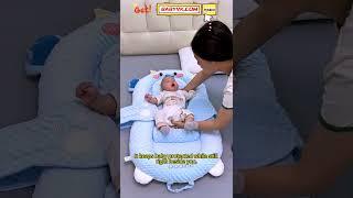 Sharing a bed with your newborn feels risky? This Baby Nest keeps them safe and snug! #BabyCare