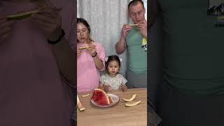 The child gave his parents a watermelon peel 