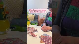 Dr. Fumiko Chino shares paper cranes with her patients
