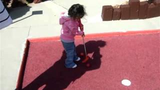 Milaniya's first minature golf experience -- (Watch out Tiger Woods)