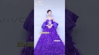 The elegance and enchantment of the purple dress she was wearing caught my eye at first sight