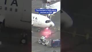 Terrifying moment Delta plane catches on FIRE forcing passengers to flee