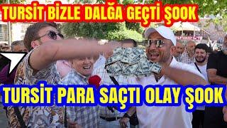 TURİST HAVAYA PARA SAÇTI. HALK İZDİHAM YAPTI. OLAYLI KAVGALI RÖPORTAJ.