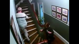 Drunk couple falling down stairs