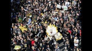 Saints fans parade through the French Quarter singing 'We got robbed'