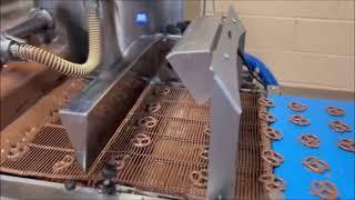 Whetstone Chocolates: Chocolate Covered Pretzels Being Made.