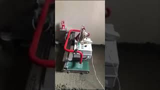 Робот Floor screed robot Clapa Floor Master для укладки полусухой стяжки на презентации в СПБ