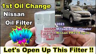 Nissan Oil Filter 15208 65F0B Used Oil Filter Cut Open Compared To A Nissan 15208 65F0E Oil Filter