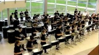 "The Lion Sleeps Tonight" by Dover Steel Drum Band